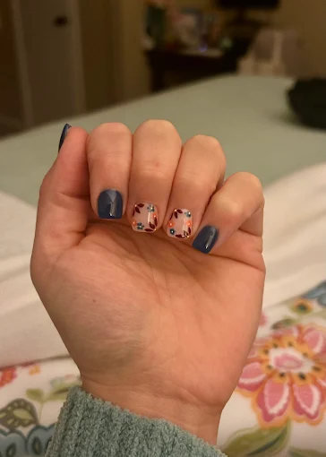Short square nails with modern black and copper designs