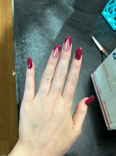 Burgundy manicure with translucent ombré accent nails