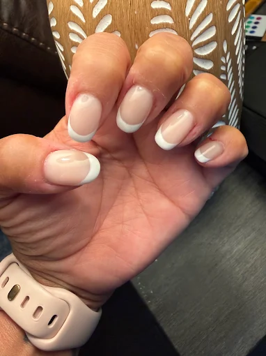 Soft white French manicure with fine silver detail